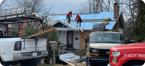 a metal roof being installed on a home